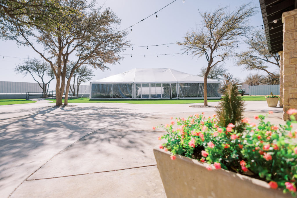 White tent of the venue at live oak in midland, TX