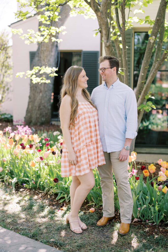 couple by the tulips of their dallas arboretum session
