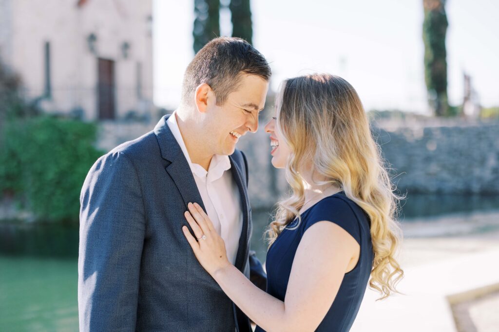 Emily+Michael smiling at their Adriatica Village Engagement session
