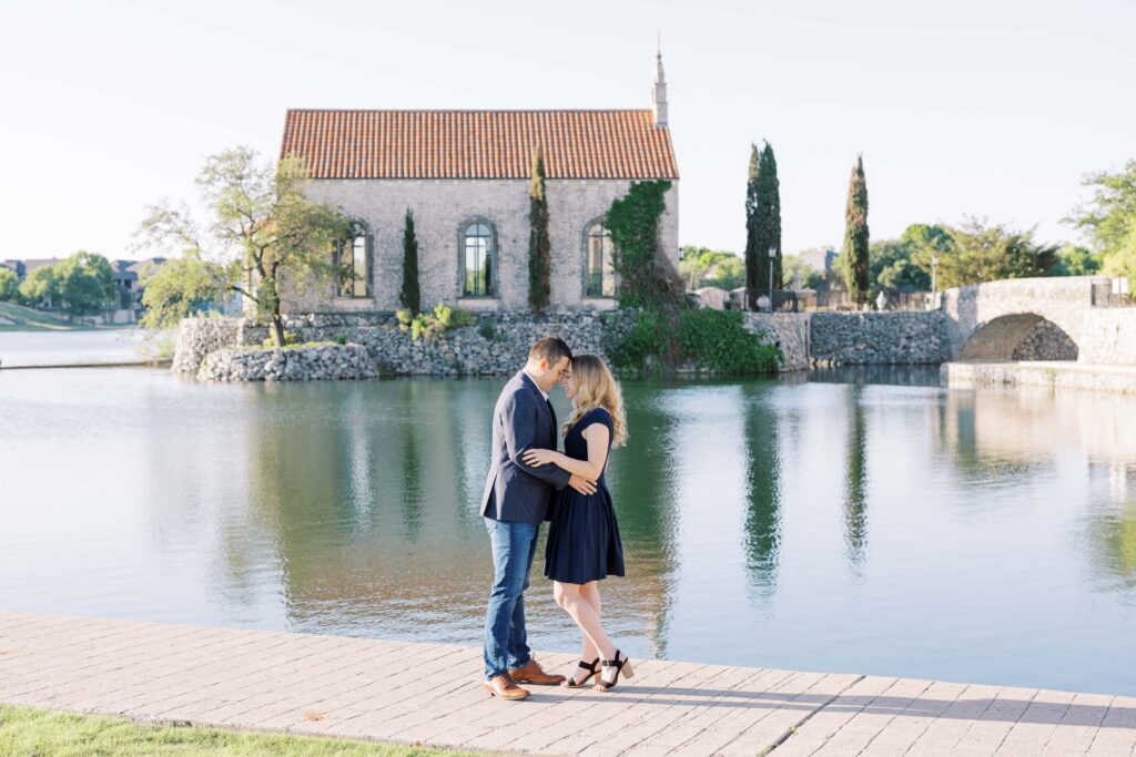  Emily+Michael forehead to forehead during their Adriatica Village Engagement session