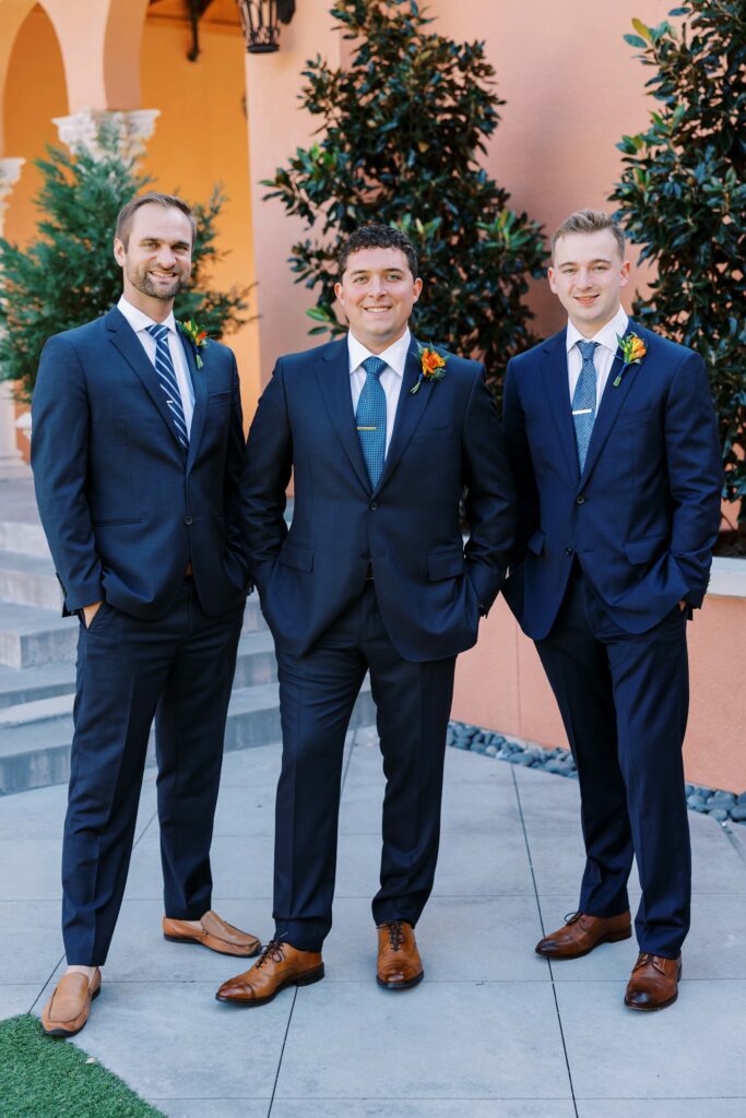 groom with his groomsmen at the rosewood mansion 