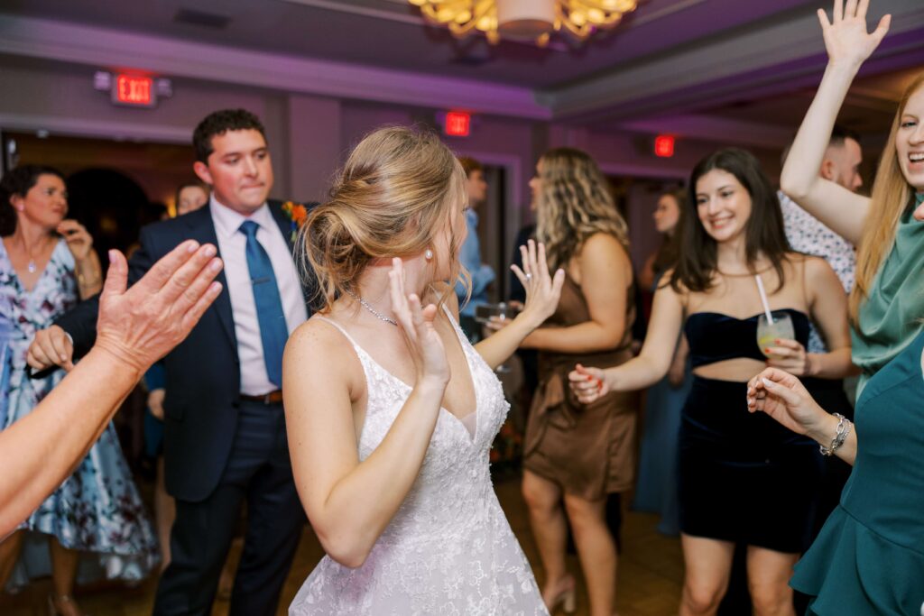 bride dancing at her wedding at the rosewood mansion 