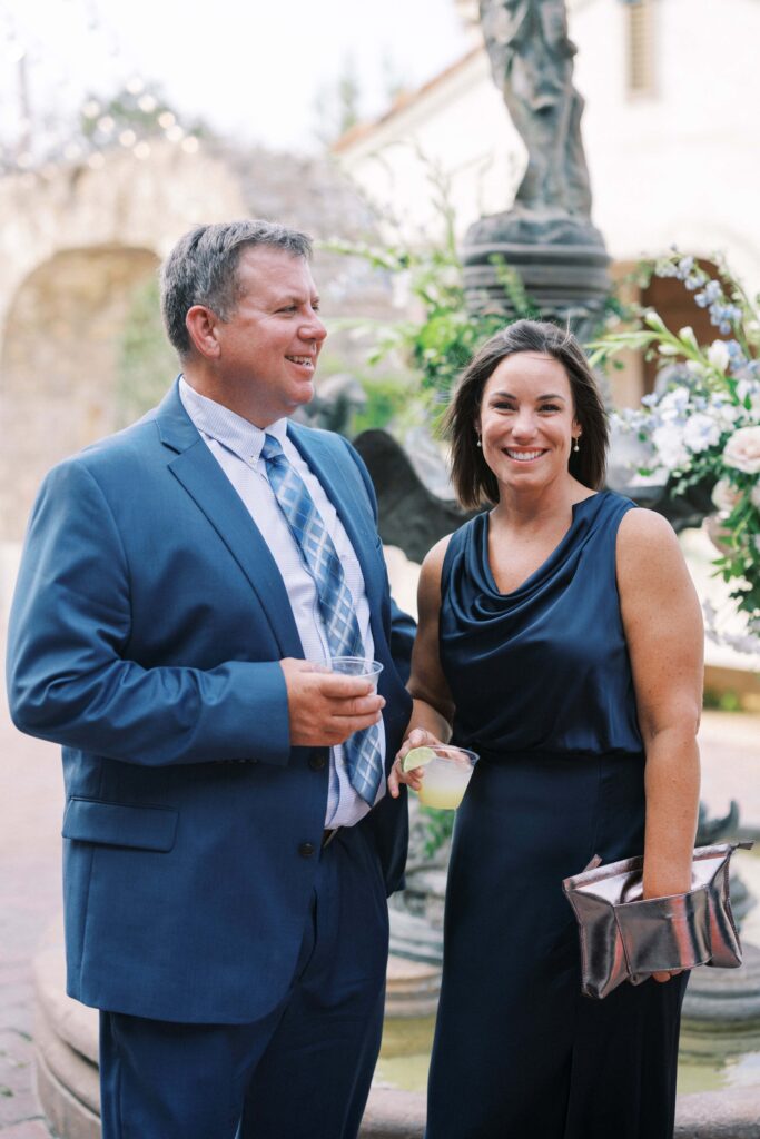 guests having a drink during this Intimate Wedding at Villa Antonia near Austin