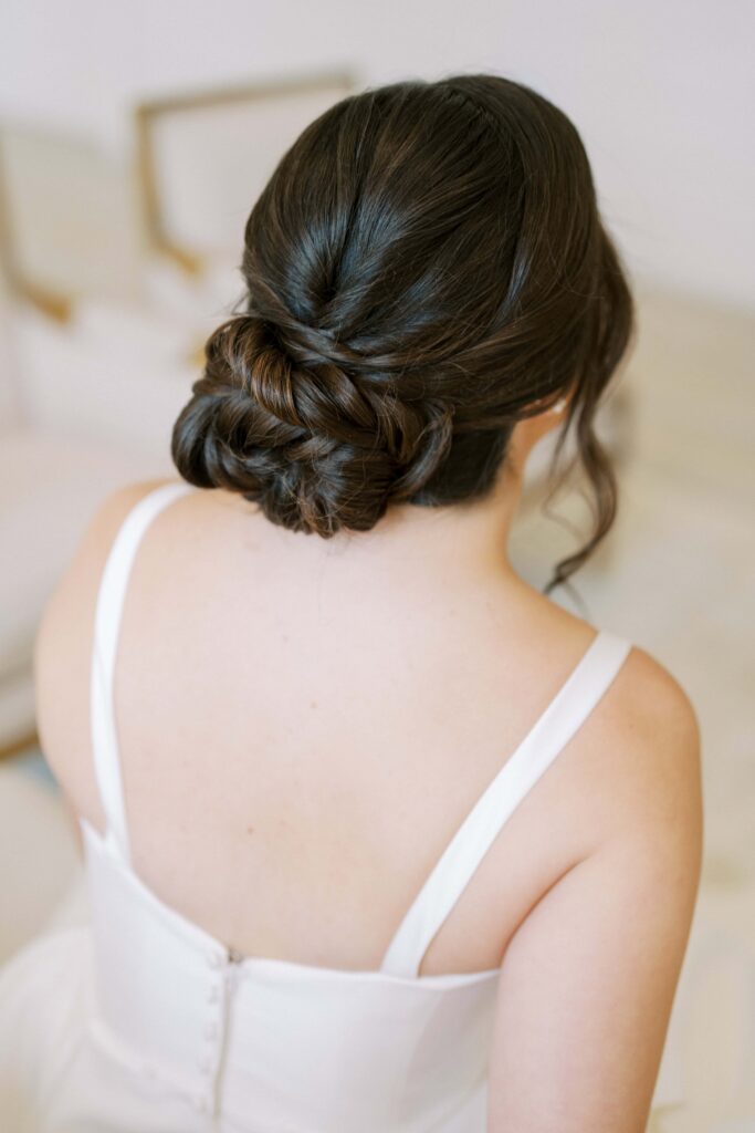 bride showing off her hairdo at The Nest at Ruth Farms