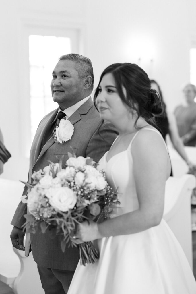 father of the bride walking his daughter down the aisle at The Nest at Ruth Farms