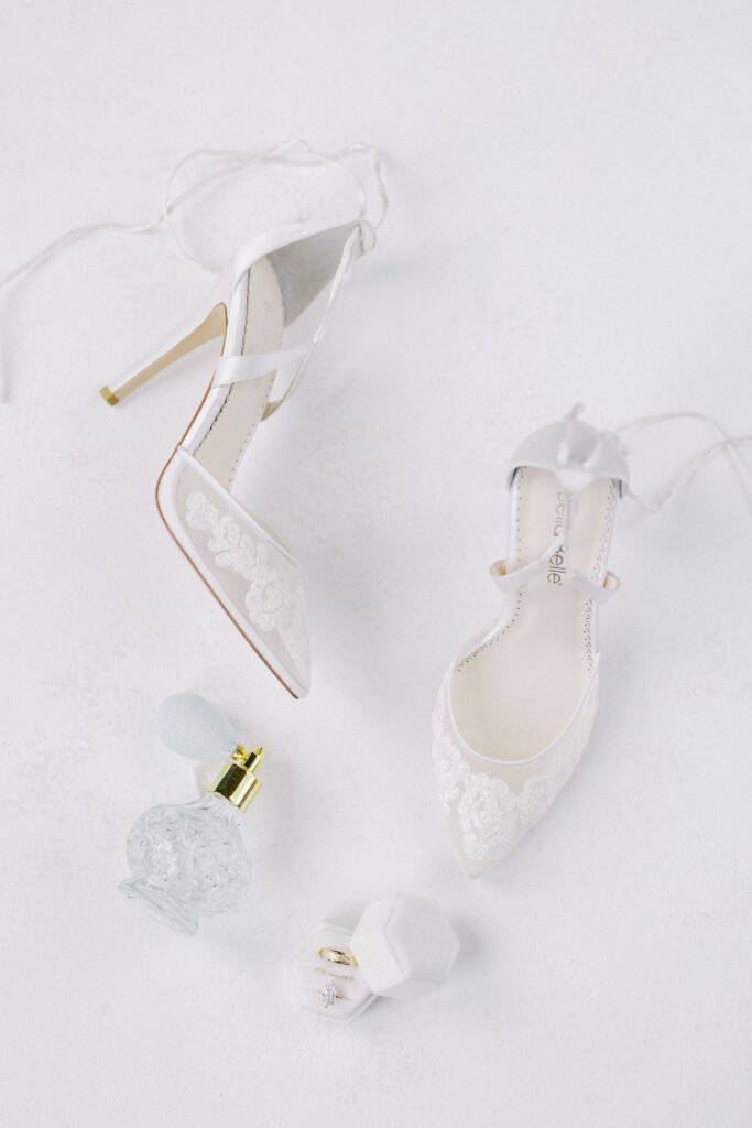 shoes and perfume flatlay at this Intimate Wedding at Villa Antonia near Austin