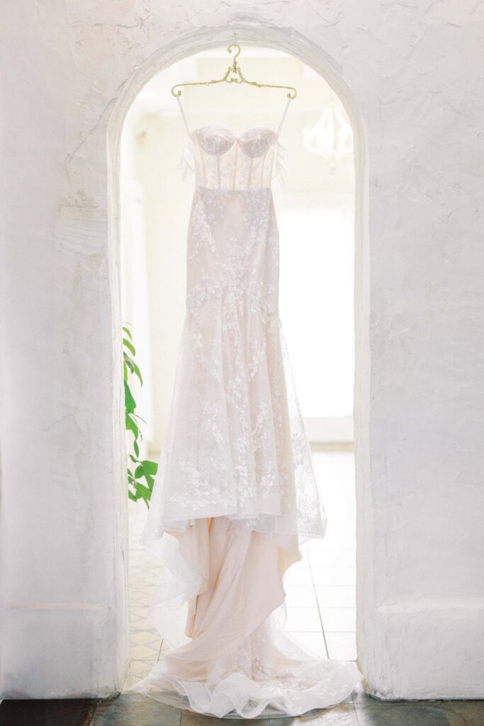 dress shot hanging in the bridal suite during this Intimate Wedding at Villa Antonia near Austin