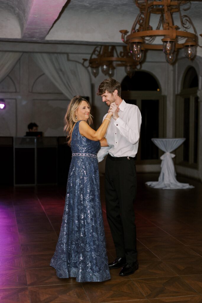 groom dancing with his mom at his Intimate Wedding at Villa Antonia near Austin