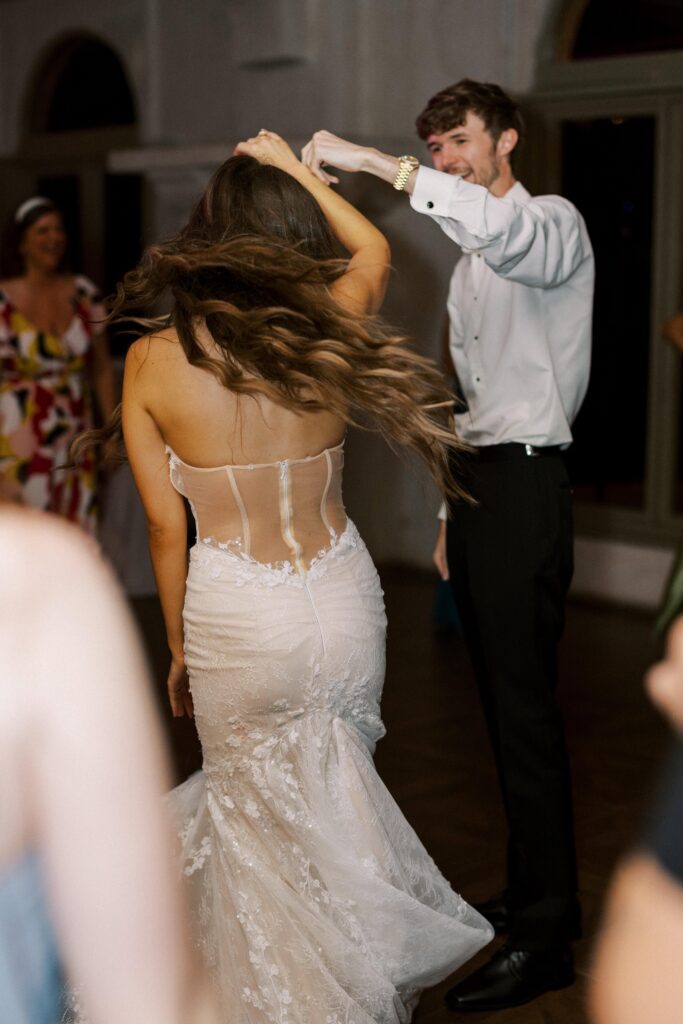 bride and groom dancing during their reception at their Intimate Wedding at Villa Antonia near Austin