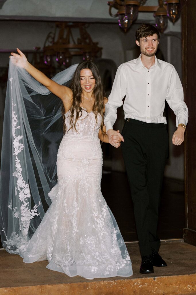 couple exiting their reception after their Intimate Wedding at Villa Antonia near Austin