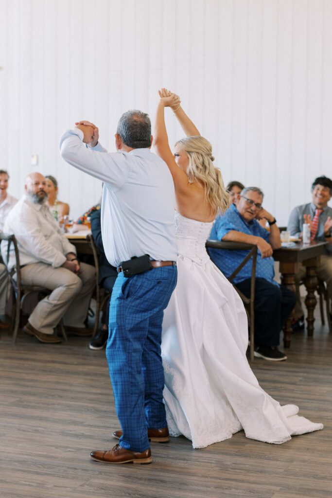 bride dancing with her father during her Wedding at Chandelier Farms