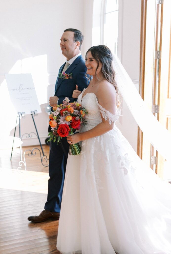 father walking his daughter down the aisle at the chapel of The Springs Event Venue Weatherford