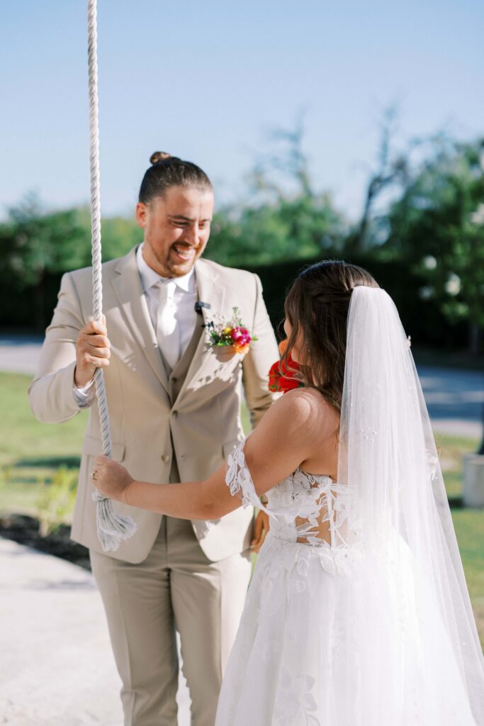 bride and groom ringing the chapel bell at The Springs Event Venue Weatherford