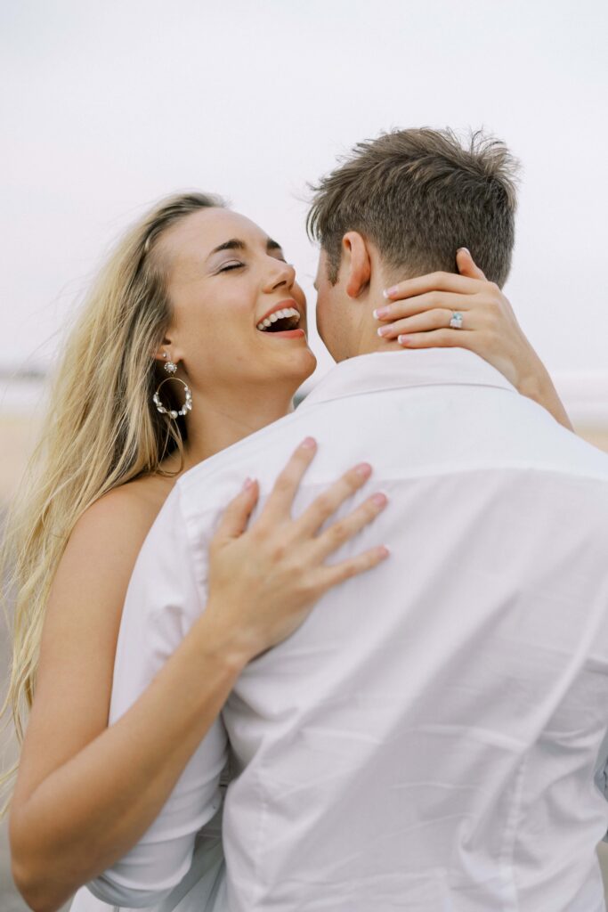 bride laughing during their Airplane Engagement Session in Dallas-Fort Worth