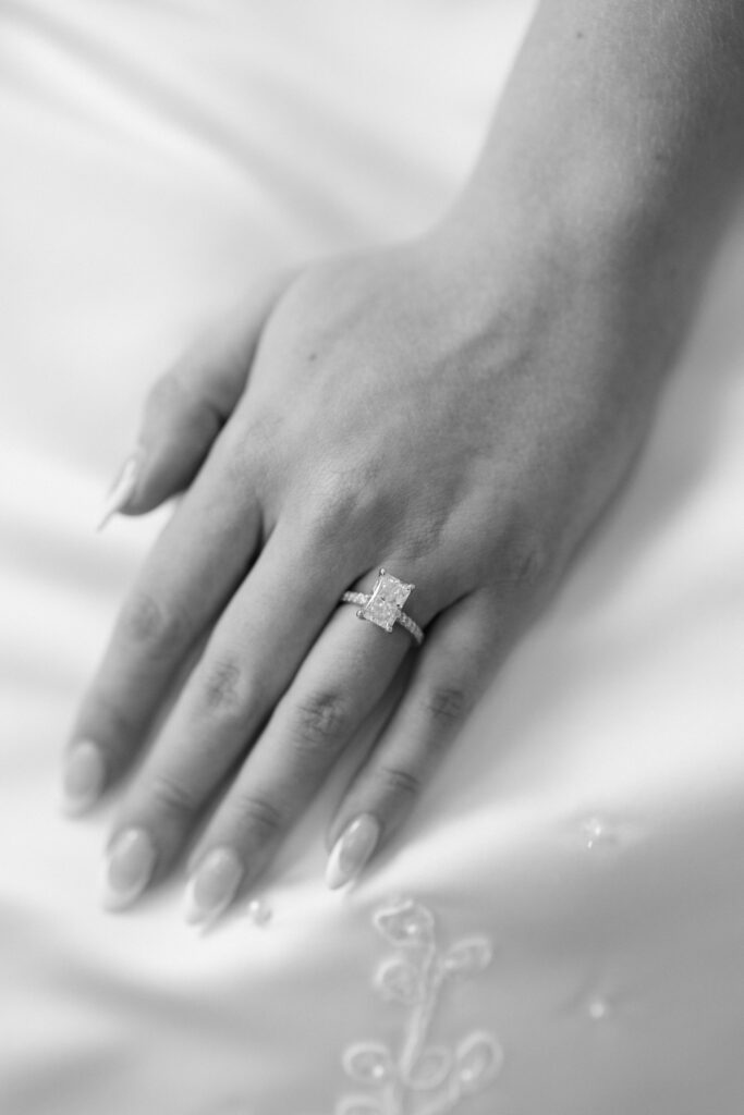 hand with engagement ring before the Wedding at Chandelier Farms