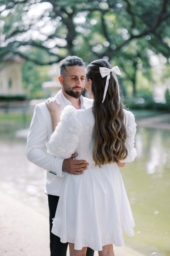 groom looking at his bride during their Engagement Session at Flippen Park