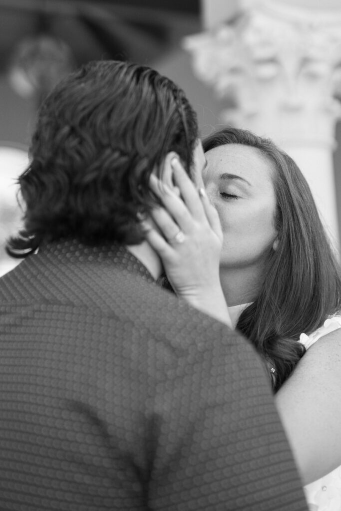 bride and groom kissing at the Rosewood Mansion in Dallas