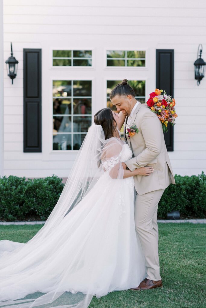 bride and groom facing each other and looking at each other at the The Springs Event Venue Weatherford