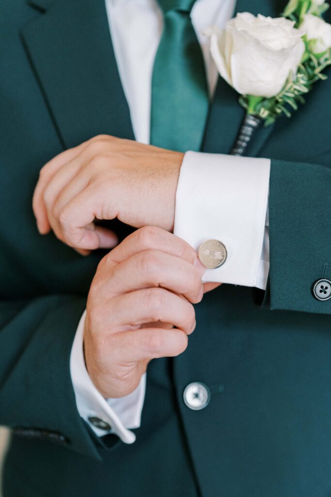 close up of sean's cuff links at his aristide mansfield wedding