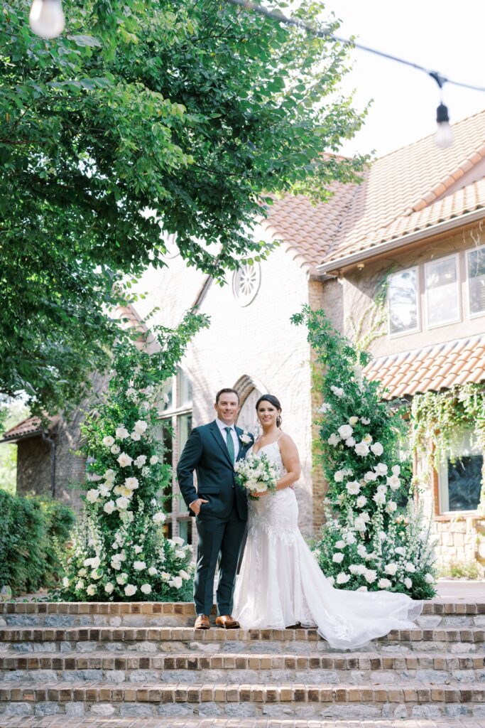 Bride and groom standing at the altar during their aristide mansfield wedding