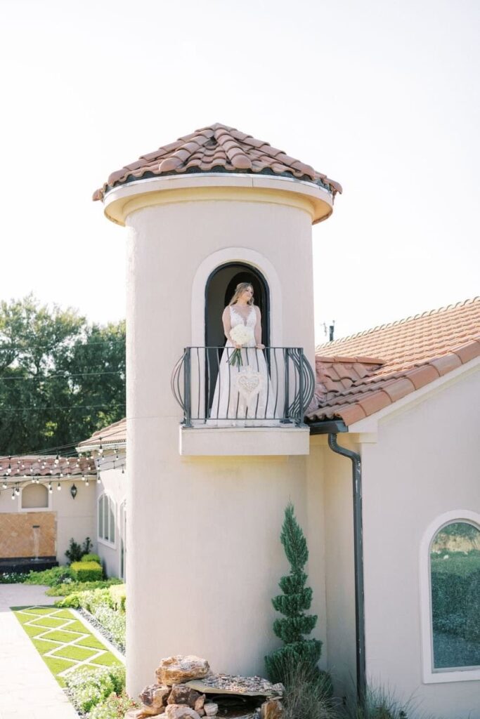 Nicole in the tower of the chapel at her D'Vine Grace Vineyard bridal session