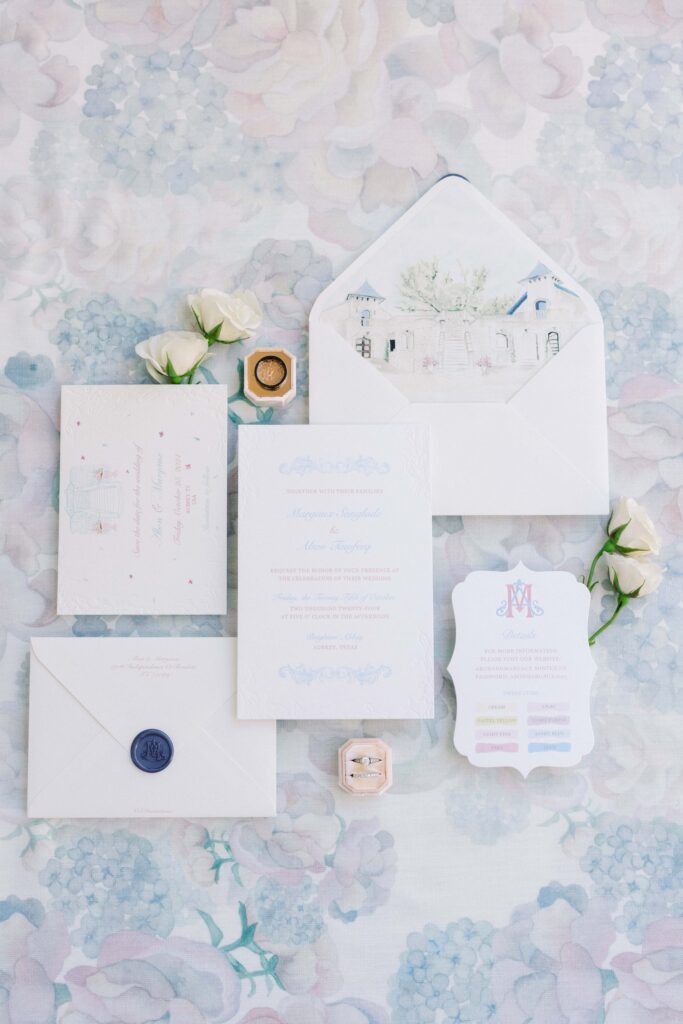 flatlay of the invitation suite of this brighton abbey wedding