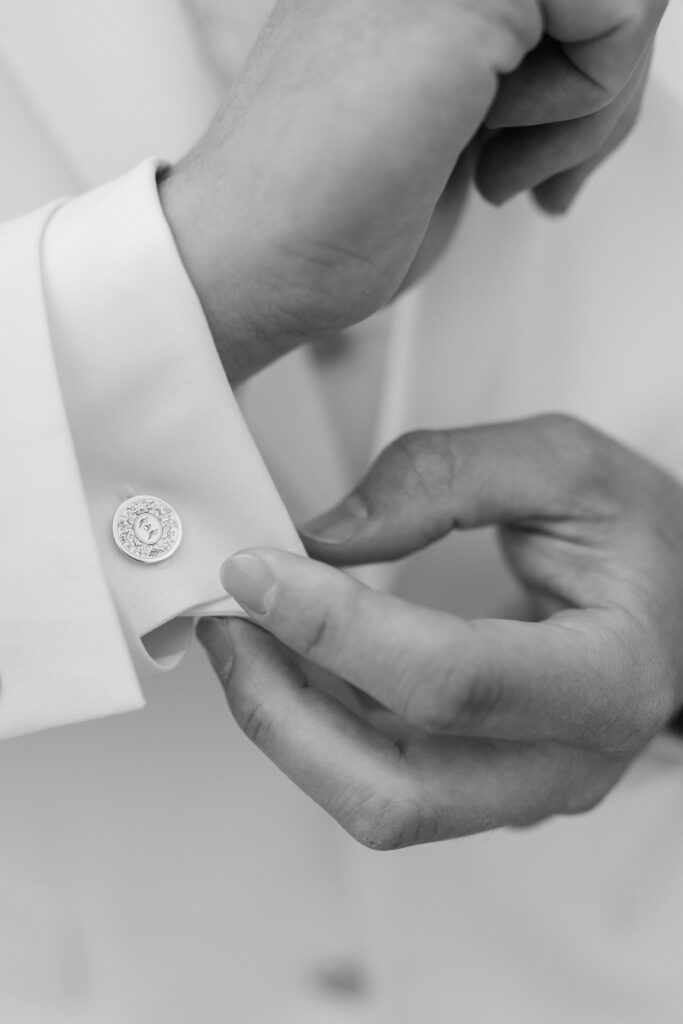 black and white of the groom's cufflinks at this Lakeview Hills Wedding