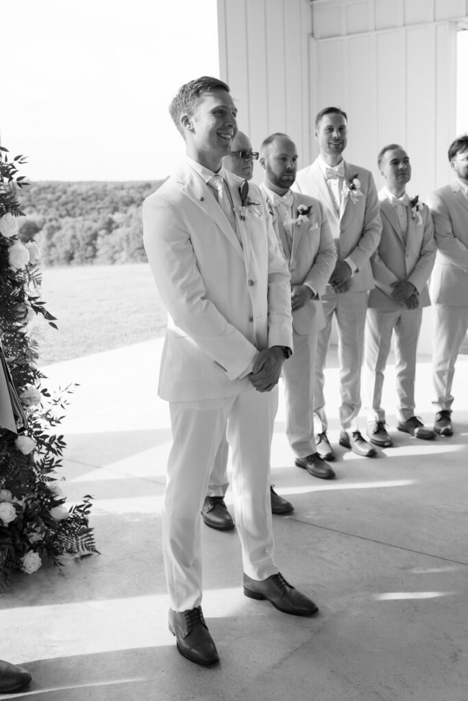 groom smiling at his bride at theor Lakeview Hills Wedding