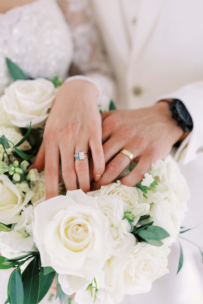 closeup of the bride and groom's rings at their Lakeview Hills Wedding
