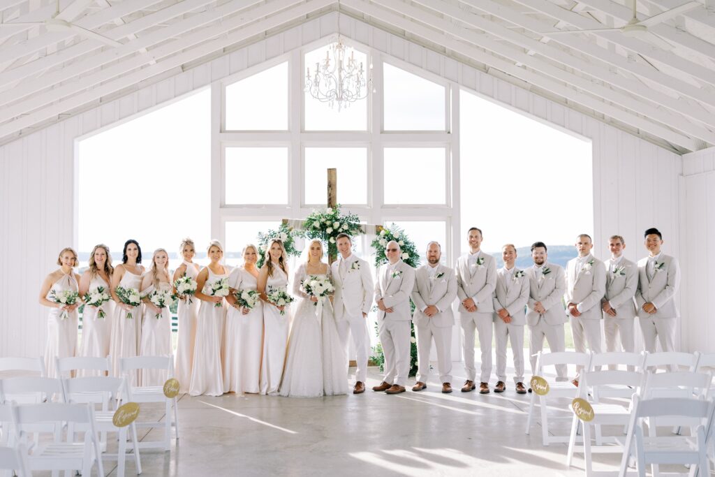 bridal party lined up at the altar for this Lakeview Hills Wedding