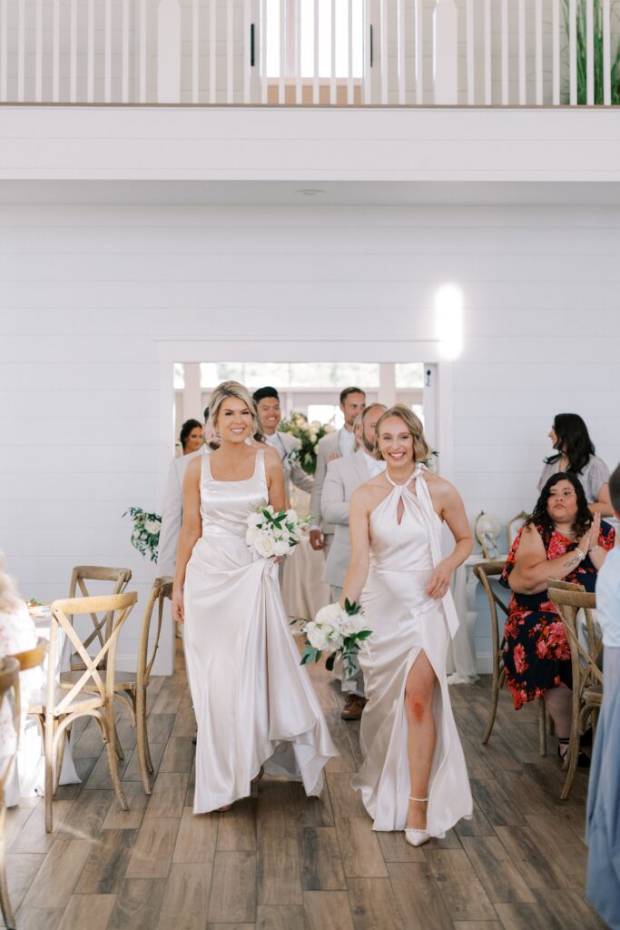 bridal party entering the reception area for this Lakeview Hills Wedding