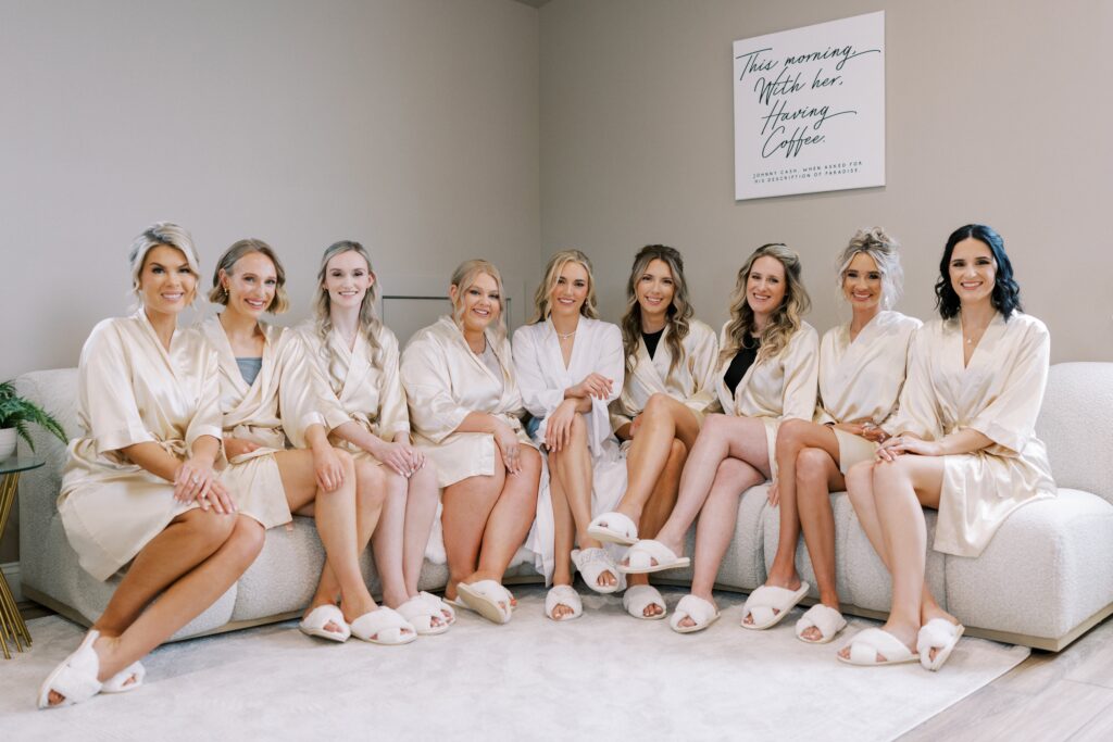 bride and her bridesmaids in their matching pajamas and robes at this Lakeview Hills Wedding